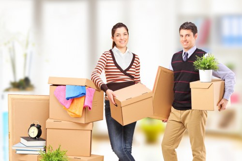 Professional movers loading furniture for a Southfields relocation