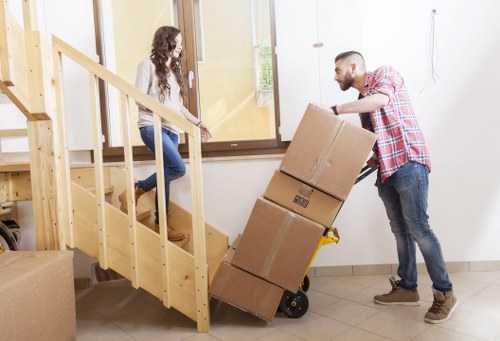 Safe packing of office technology and furniture during Southfields removals