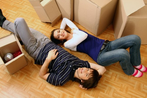 Neatly labelled household storage boxes and furniture arranged for easy access